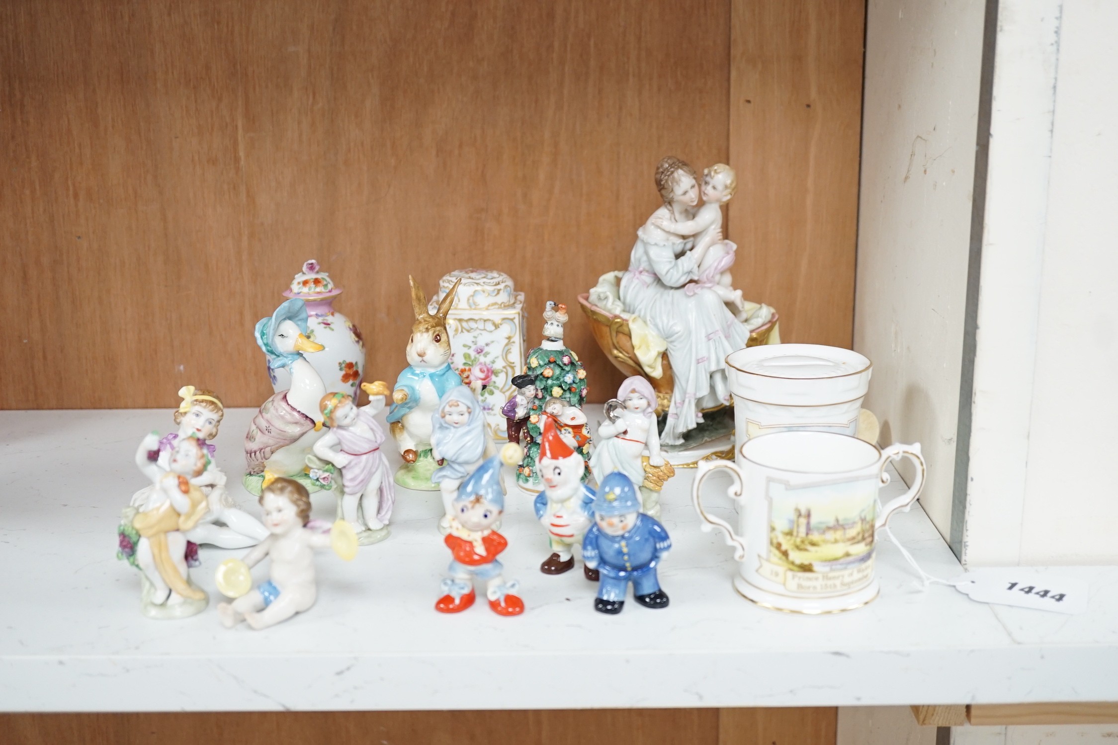 A small group of various porcelain figures etc. including Beatrix Potter and continental porcelain